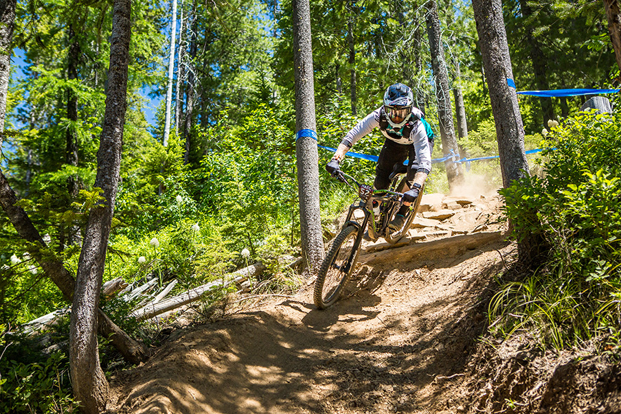 Biker racing down the mountain during the North American Enduro Cup.