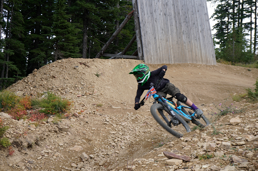 Biker races around the corner on Hammer